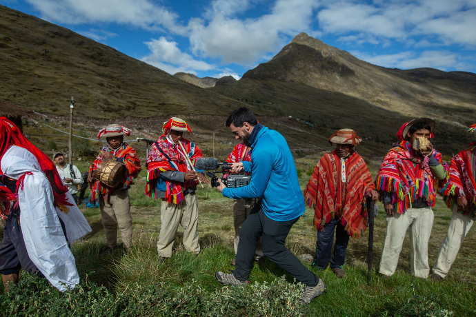 Ben Hemmings, mainspring agency director, films at a Quechua ceremony in the high andes