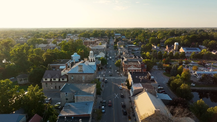 a cinematic aerial photo of downtown Perth, ontario